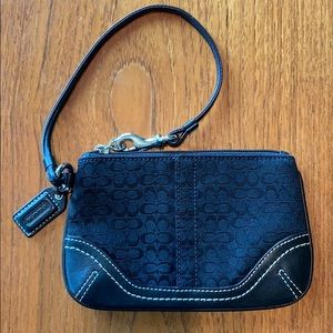 Small black Coach wristlet